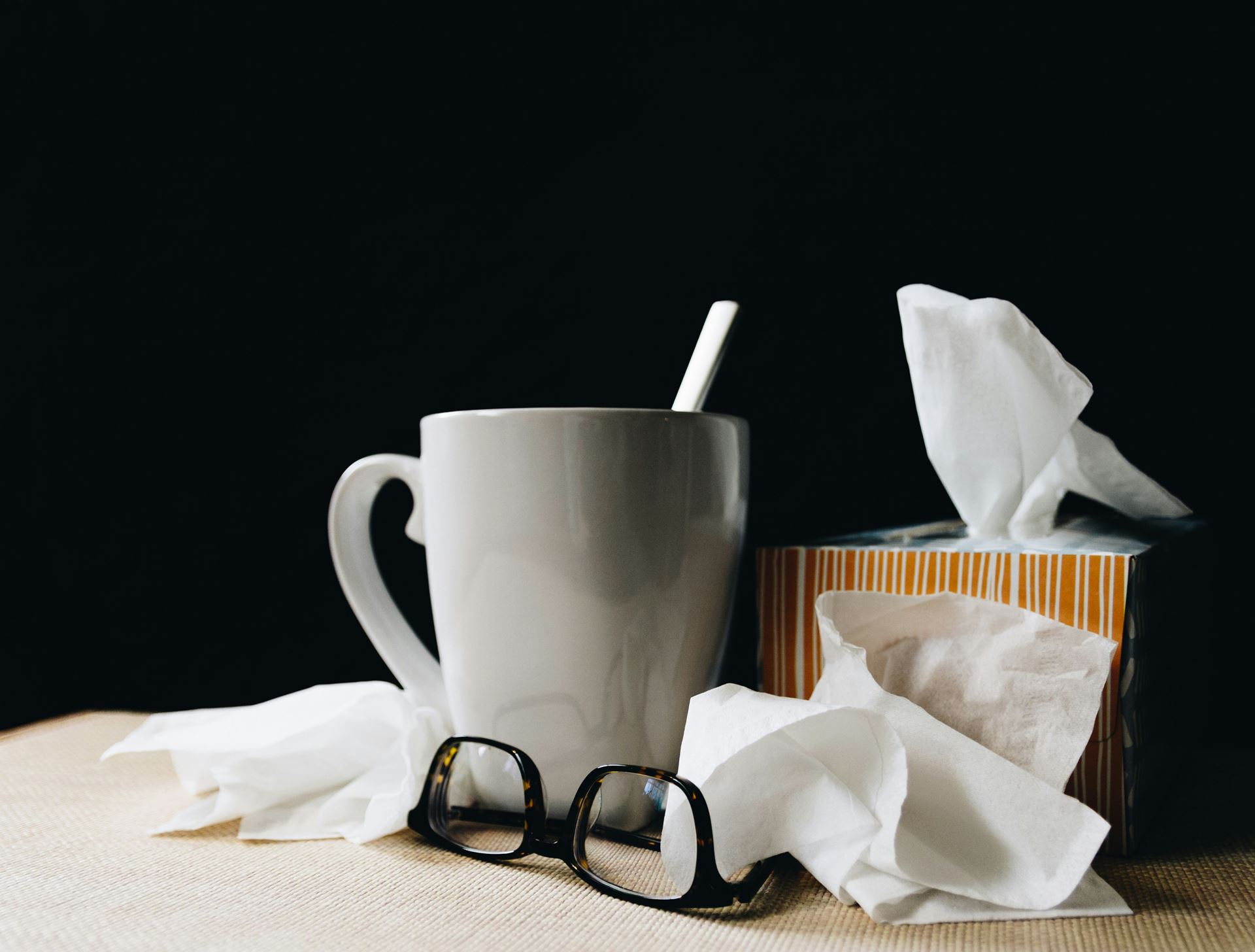 cup glasses and tissues 